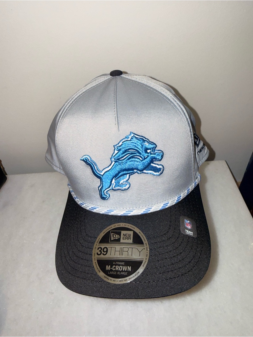 New Era Silver and Black Detroit Lions 39THIRTY Cap with Blue Logo